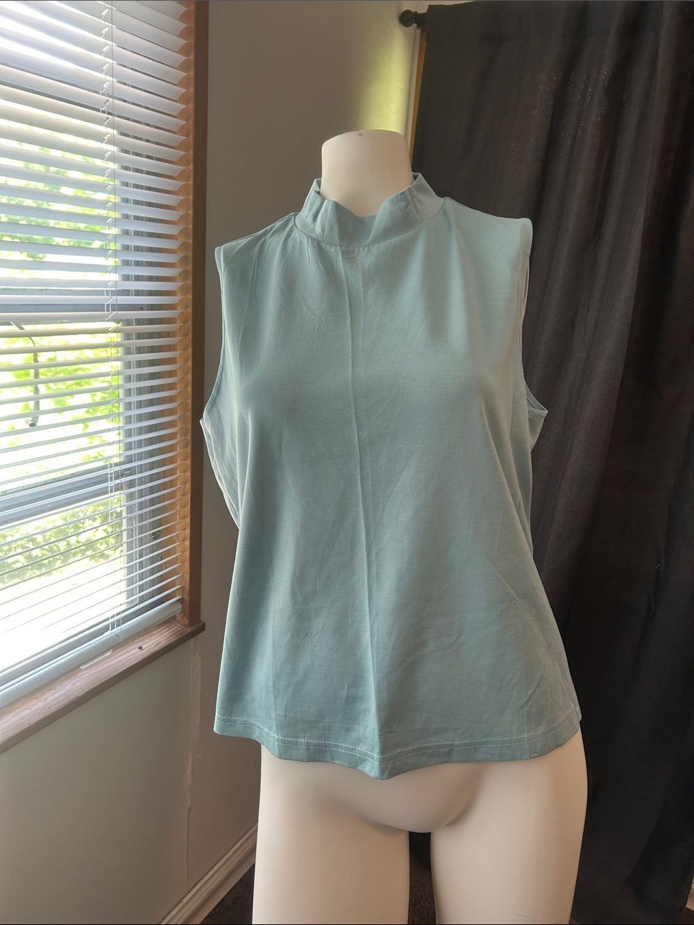 Sampeel sleeveless Mock Neck Top in Light Blue